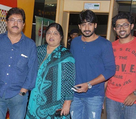 Devaraj with wife and sons