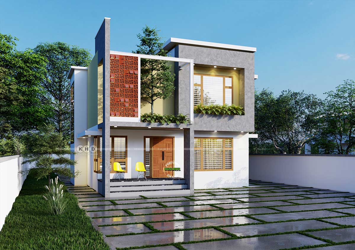 Exterior view of 'Nature's Embrace' – a 2642 sq.ft. 4-bedroom modern home showcasing harmonious colors and a clay jali show wall surrounded by lush greenery.