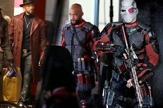 The director of the upcoming Warner Bros supervillains movie shared a solo shot of Will Smith in the red and black costume, complete with a full white headmask with cybernetic eye