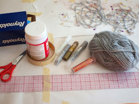 materials needed to make sparkly and lacy yarn spider webs