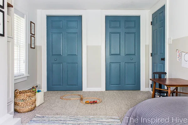 Blue doors. Kids activity table. Train track toys. 