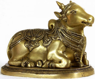 Nandi, the bull mount of Shiva. Guardian of all quadrupeds, he is Shiva's chamberlain and provides the music for the Tandava, the dance of Shiva Nataraja. 