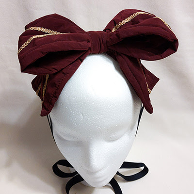 Metamorphose Ribbon Headdress with Cat Brooch (2016) Bordeaux