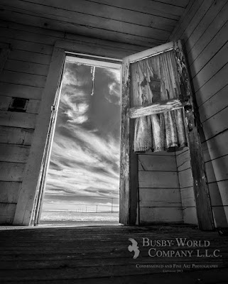 A view of space through an abandoned door. Spokane Photogrpher