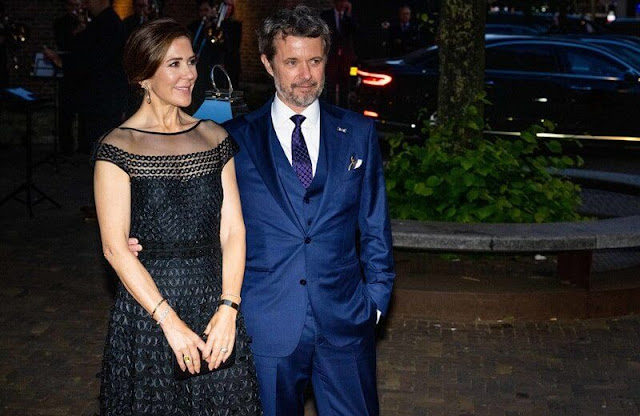 Crown Princess Mary wore a Temperley London gown. Queen Maxima wore a Carolina Herrera dress
