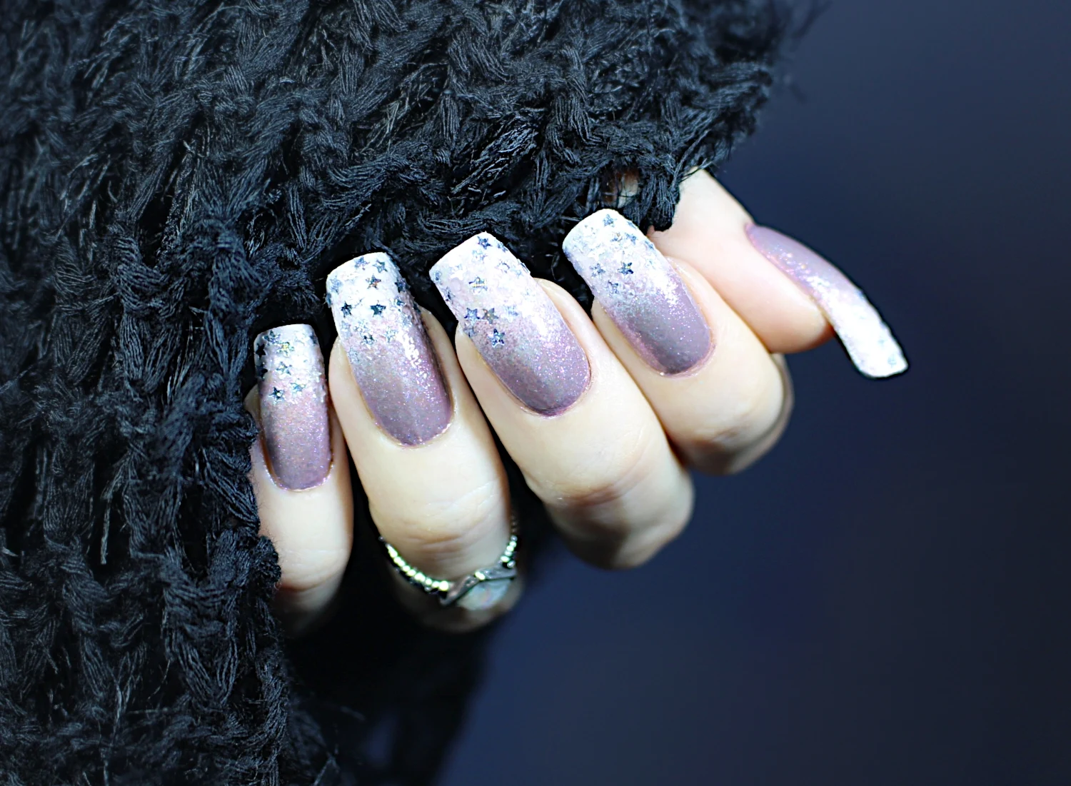 a close-up of a sparkly nail look with lilac and white gradient, inspired by fairycore