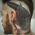 Black Pigeon On Men Head Tattoo Designs