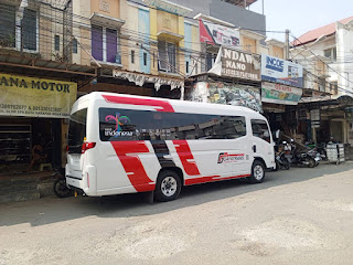 rental elf bekasi