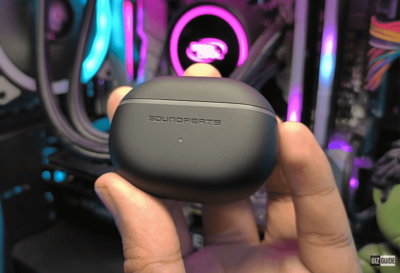 The charging case has a matte finish with a LED indicator in front