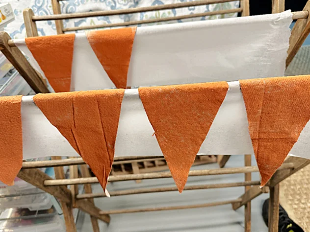 pennants drying on rack