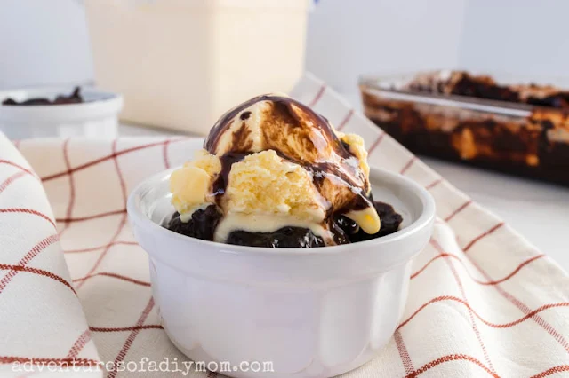 chocolate pudding cake with a scoop of ice cream on top