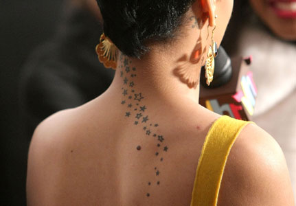star neck tattoos. 2011 rihanna tattoo pictures.