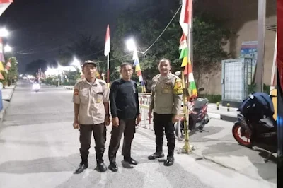 Bhabinkamtibmas Lakukan Sambang Dialogis di Posko Security Perum Puri Telukjambe