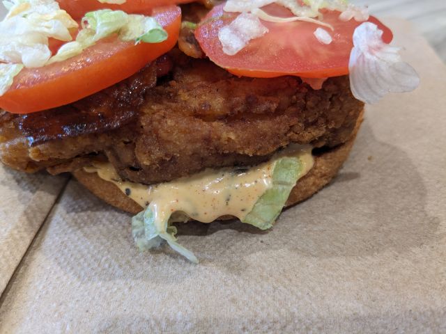 Close-up of McDonald's Bacon Cajun Ranch Deluxe McCrispy.