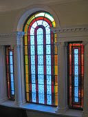 stained glass over staircase
