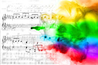 A conventionally written stave of music (black on white) starts to warp and dissolve as the notes turn into clouds of colour across a spectrum.