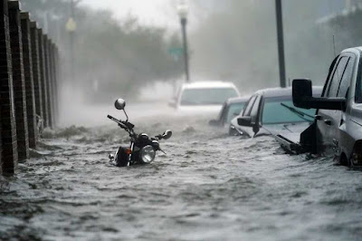 Flood waters move on the street, Wednesday, Sept. 16, 2020, in Pensacola, Florida-AP Photo