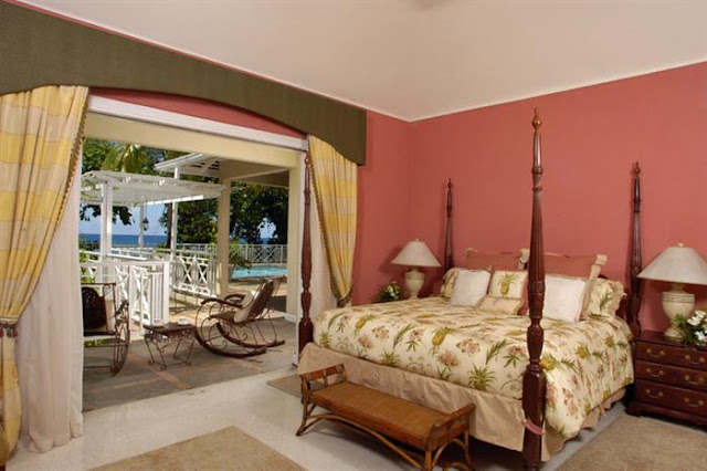Photo of second bedroom with king sized bed and the terrace