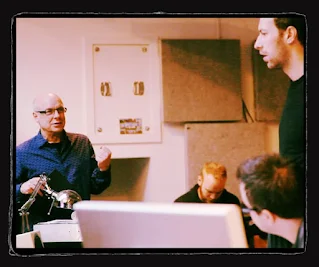 Brian Eno con Coldplay (Chris Martin)