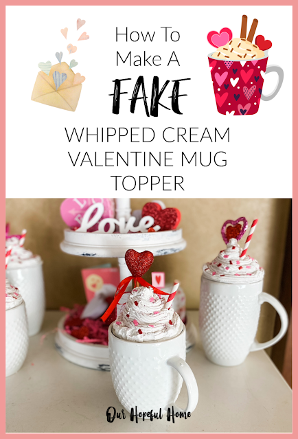 large white mugs filled with faux whipped cream and Valentine's decorations