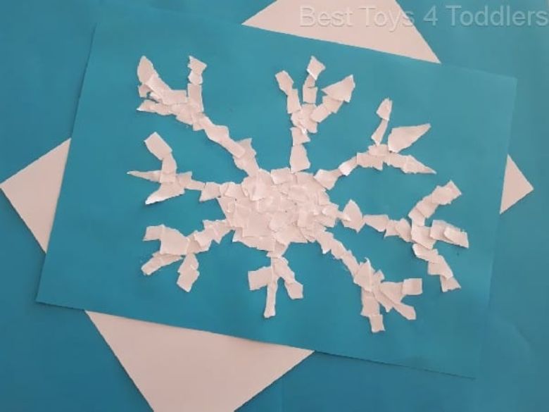 Torn paper snowflake craft for preshoolers