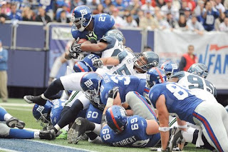 Brandon Jacobs of the New York Giants scores a touchdown in the second quarter. (Al Bello, Getty Images / October 5, 2008)