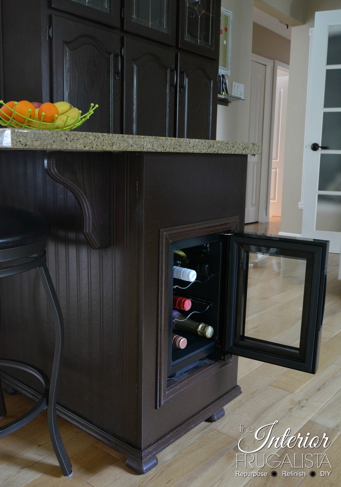 A clever China Cabinet Hack! How to repurpose a small dining hutch into a kitchen pantry AND small kitchen island for a budget kitchen makeover idea.