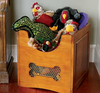 wooden dog toy bin, full of toys