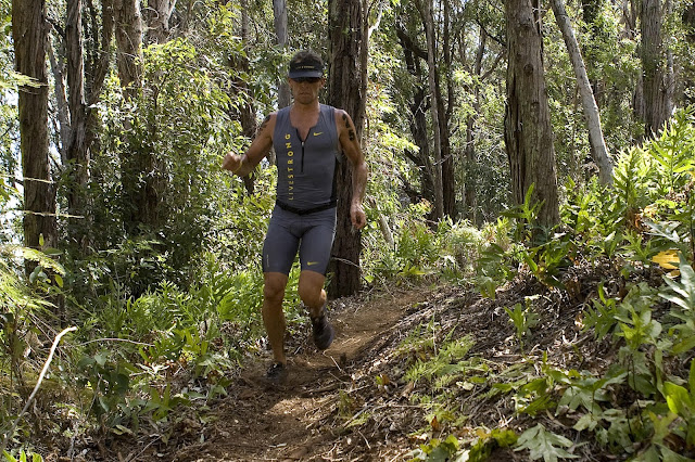 Lance Armstrong runs on the trail during the running portion of the Xterra World Championship triathlon in Kapalua, Hawaii, on October 23, 2011. Armstrong’s win in a trail race last weekend has sparked discussion about doping in trail races