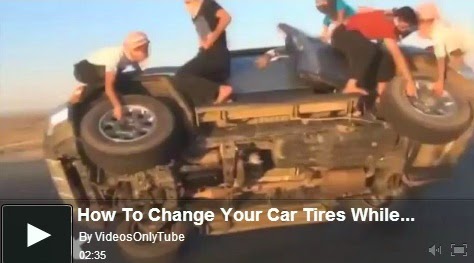 http://funkidos.com/videos-collection/amazing-videos/how-to-change-your-car-tires-while-driving