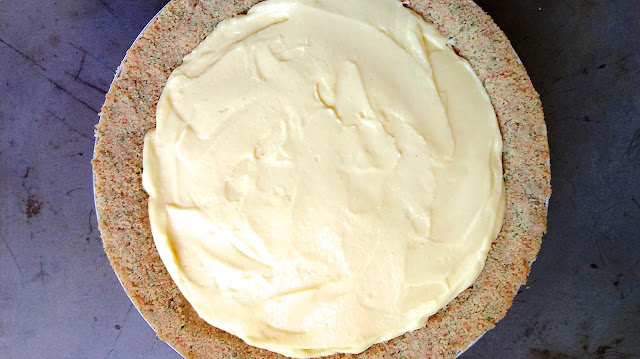 pudding filled Eggnog Cream Pie on a rustic baking sheet