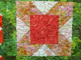 Sue Lindsay's Batik Star Table Topper Quilt