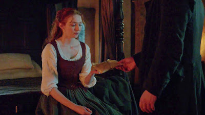 Ross Poldark giving Demelza a gift of stockings in the stocking scene