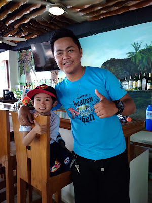 my-son-with-the-friendly-staff-of-montani-beach-resort