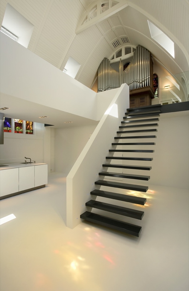 Black minimal staircase to the upper floor