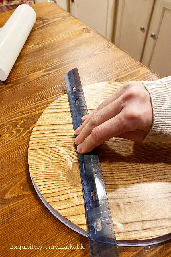 Smoothing Contact Paper Bubbles With A Ruler