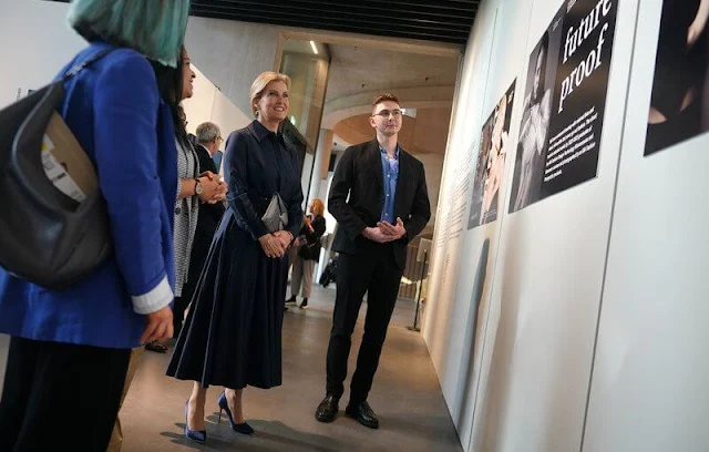 The Duchess of Edinburgh wore a Marione navy and black prince of wales check dress by Emilia Wickstead. London Fashion Week 2024