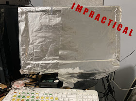 [Image: A monitor completely wrapped in tinfoil, with the text IMPRACTICAL written over it.]