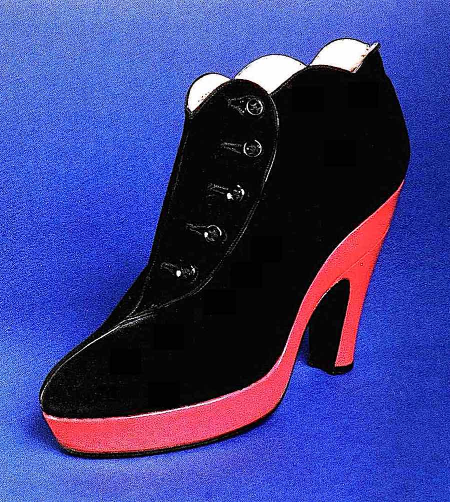 a 1939 designer shoe in black and red, a color photograph