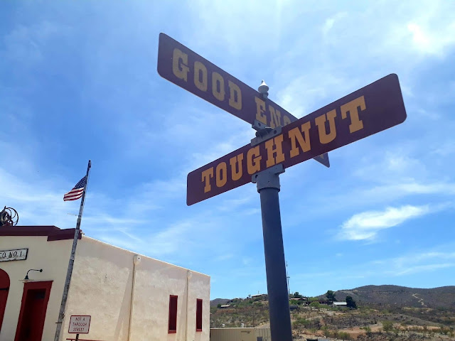 street signs and American flag