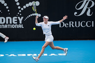 Aliaksandra Sasnovich in White Dress at 2019 Sydney International Tennis