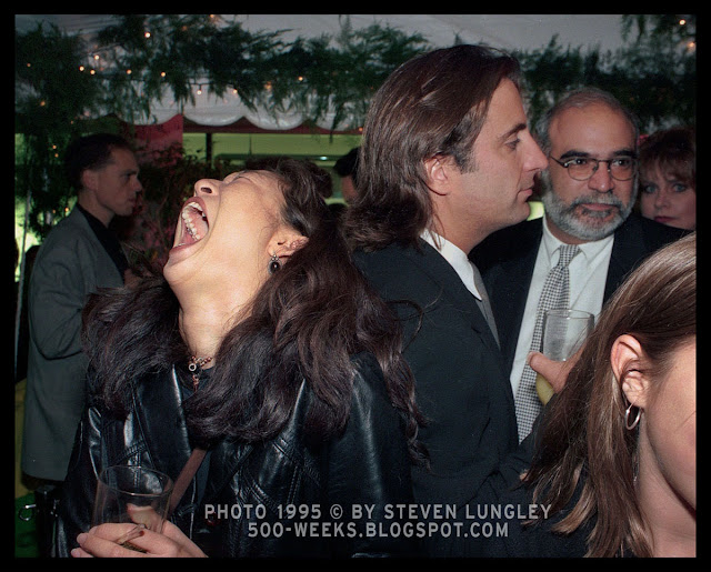 Sandra Oh laughing near Andy Garcia, TIFF, 1995 frame 04. Photo © 1995 Steven_Lungley