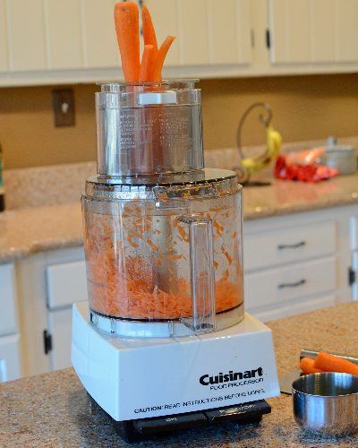 Grating carrots for Carrot-Jalapeño Quick Pickle Relish, no canning required ♥ KitchenParade.com.