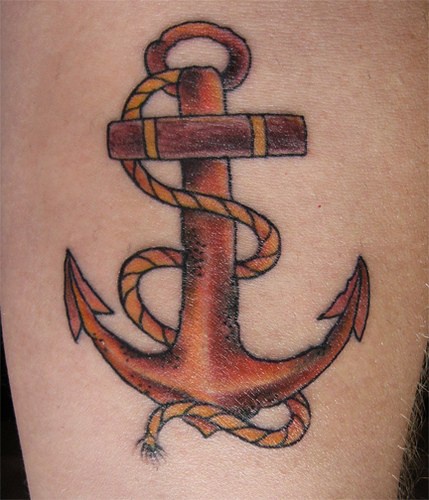 Rusty anchor cross coloured tattoo