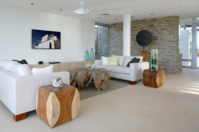 White couch and wooden coffee tables 