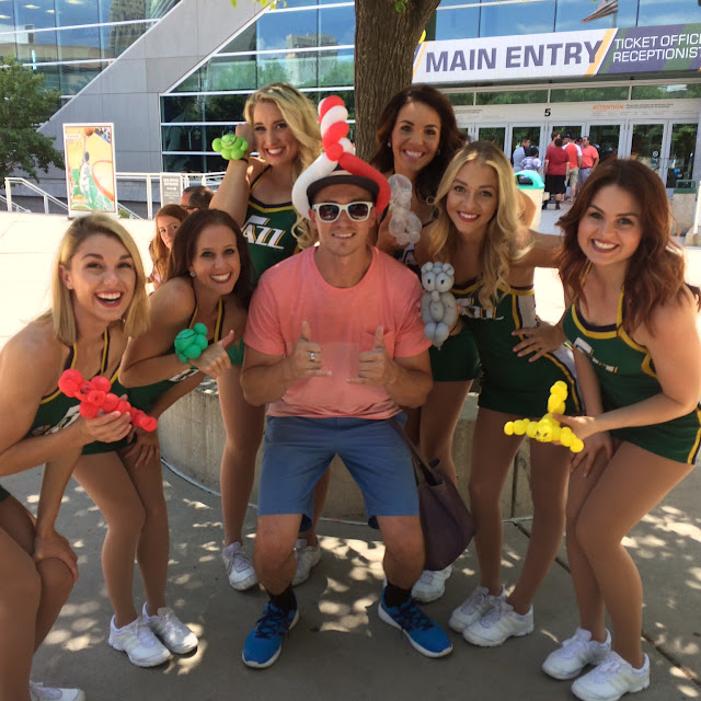 The Utah Balloon Artist posing with the Utah Jazz dancers after they all got balloon animals