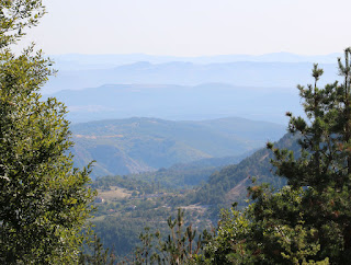 Mountains march into the blue distance