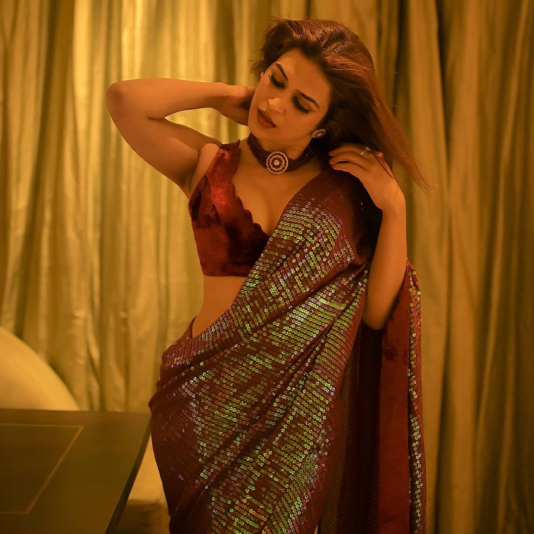 Shraddha das maroon sequin saree velvet blouse and choker necklace