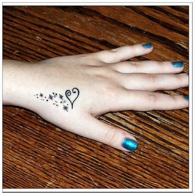 heart_shape_stars-hand tattoo