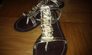 The yama aparigraha and little gold sandals.